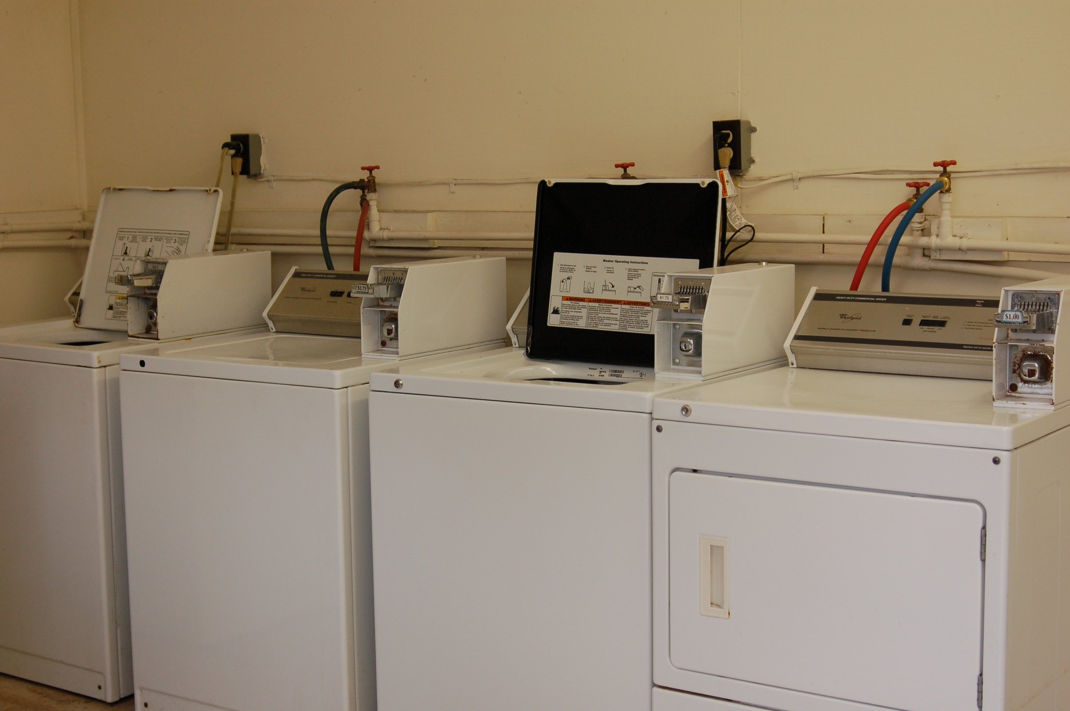 Coin-operated dryers in the Sunshine laundry room